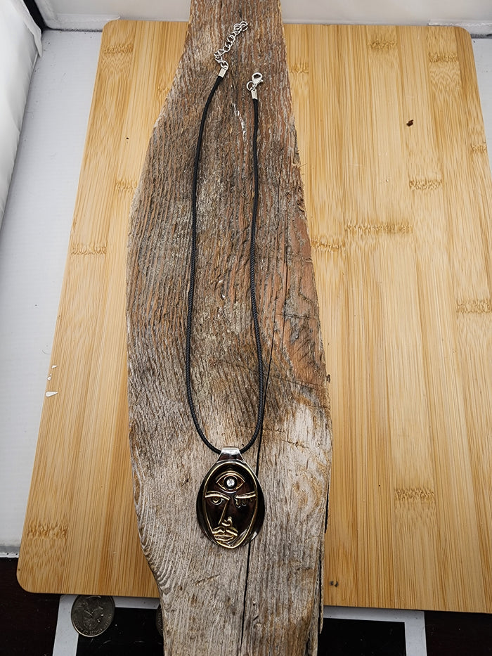 18in Adjustable Abstract Face Pendant Necklace in Silver and Gold Tone