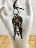 Black Cord Necklace with Antiqued Metal Charm Disc and Dangling Charms