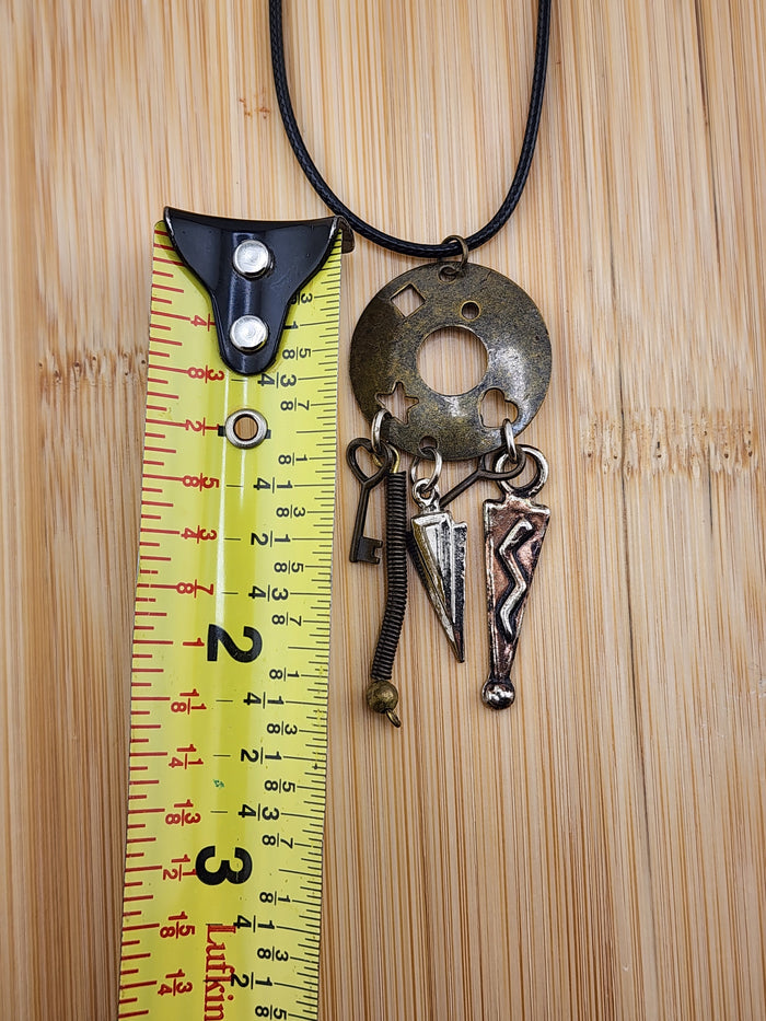 Black Cord Necklace with Antiqued Metal Charm Disc and Dangling Charms