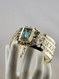 Gold Tone Cuff Bracelet with Multicolor Center Stone and Blue Accent Gems 0543