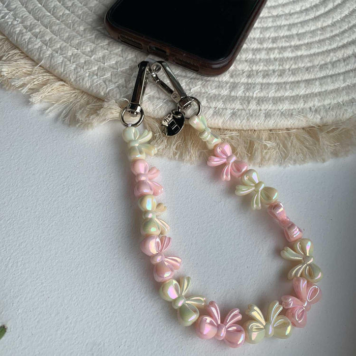 Telefoonkoord Bow - lichtroze wit - zilver